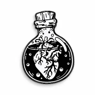 Black and white enamel pin featuring an anatomical heart suspended inside a round corked potion bottle.